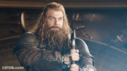 Man With Long Hair And Beard Holding Sword GIF