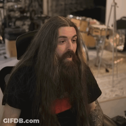 Man With Long Hair And Beard In Black Shirt GIF