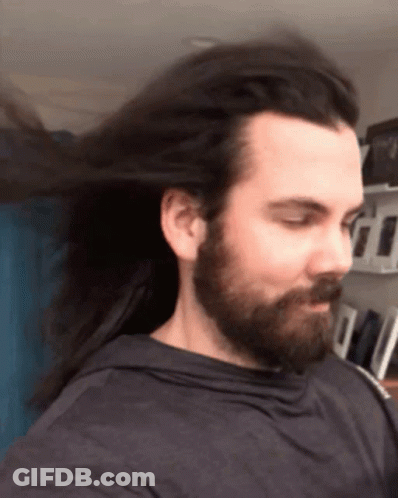 Man With Long Hair And Beard In Black Shirt GIF