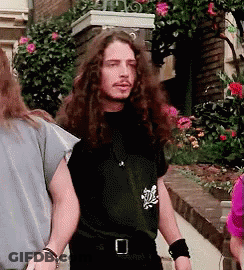 Man With Long Hair And Beard In Black Shirt With O GIF