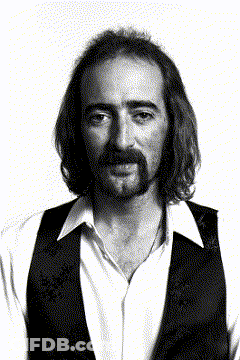 Man With Long Hair And Beard In Black Vest GIF
