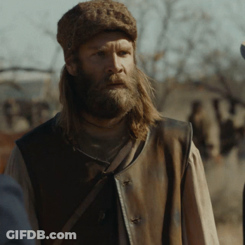 Man With Long Hair And Beard In Brown Vest GIF