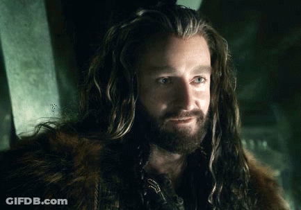 Man With Long Hair And Beard In Fur Coat GIF