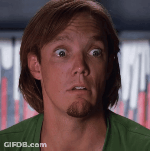 Man With Long Hair And Beard In Green Shirt GIF