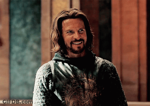 Man With Long Hair And Beard In Green Shirt GIF