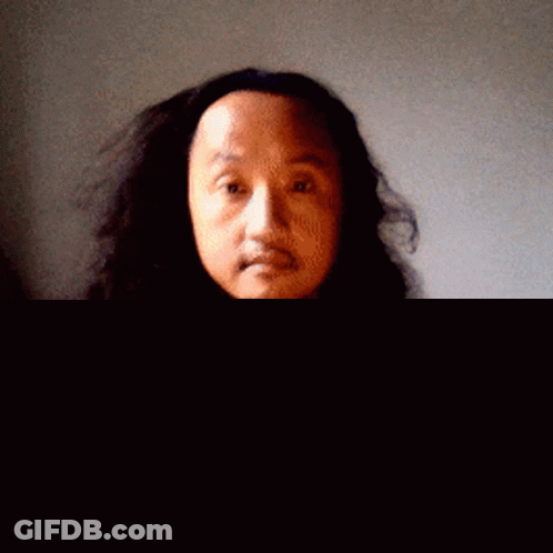 Man With Long Hair And Beard In Grey Sweater GIF