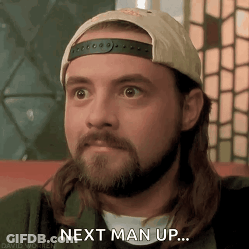 Man With Long Hair And Beard In Hat Saying Next Man Up GIF