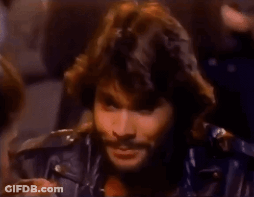 Man With Long Hair And Beard In Leather Jacket GIF
