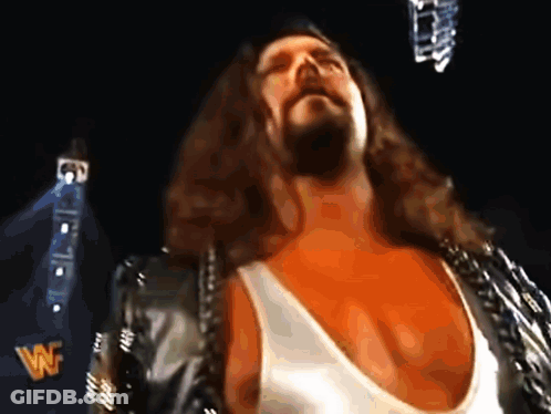 Man With Long Hair And Beard In Leather Jacket GIF