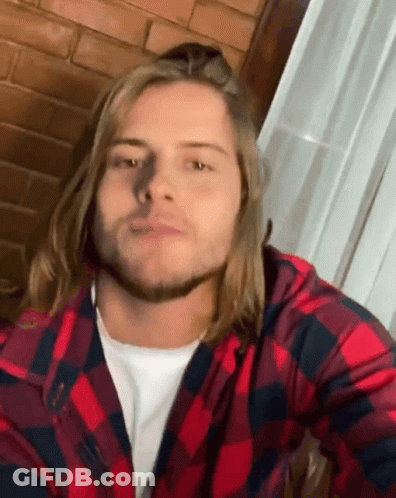 Man With Long Hair And Beard In Plaid Shirt GIF