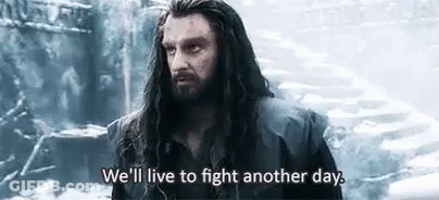 Man With Long Hair And Beard In Snow Saying We'll Live To Fight Another Day GIF