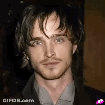 Man With Long Hair And Beard In Suit GIF