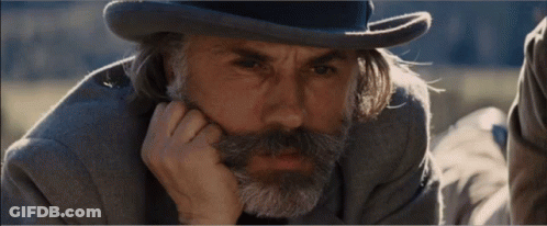 Man With Long Hair And Beard In Top Hat GIF