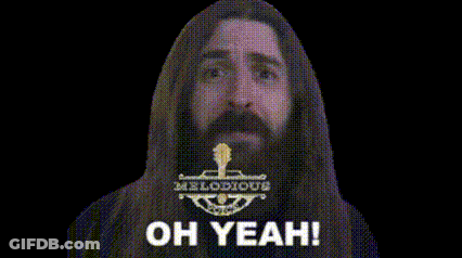 Man With Long Hair And Beard Making Devil Horns Saying Oh Yeah GIF