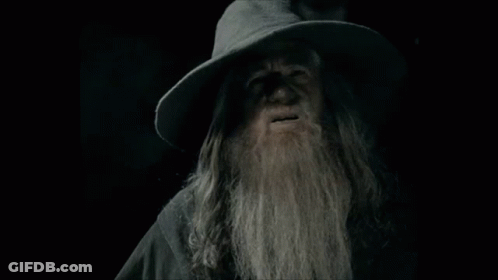 Man With Long Hair And Beard Making Funny Face GIF