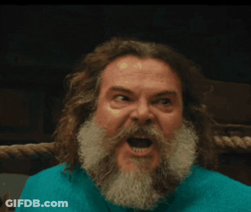 Man With Long Hair And Beard Making Funny Face GIF