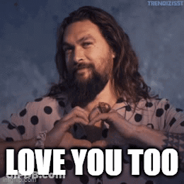 Man With Long Hair And Beard Making Heart Shape GIF