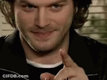 Man With Long Hair And Beard Pointing GIF