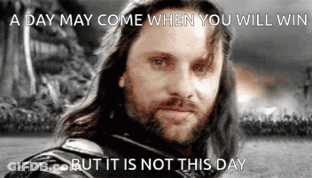 Man With Long Hair And Beard Saying A Day May Come When You Win But Not This Day GIF