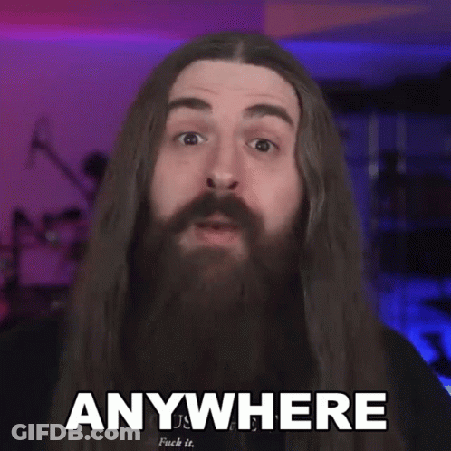 Man With Long Hair And Beard Saying Anywhere GIF