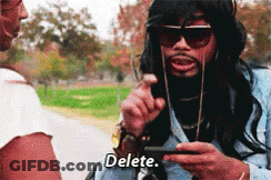 Man With Long Hair And Beard Saying Delete GIF