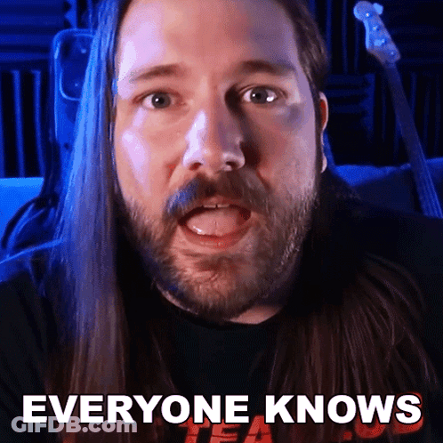 Man With Long Hair And Beard Saying Everyone Knows GIF