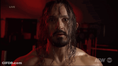 Man With Long Hair And Beard Saying Good GIF