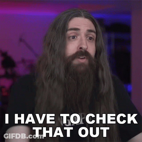Man With Long Hair And Beard Saying He Has To Check That Out GIF