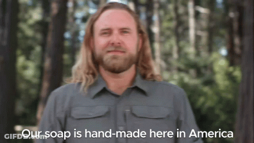 Man With Long Hair And Beard Saying Our Soap Is Hand-Made Here In America GIF