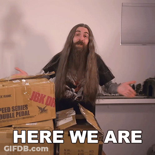 Man With Long Hair And Beard Says Here We Are GIF