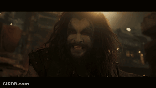 Man With Long Hair And Beard Screaming In The Dark GIF