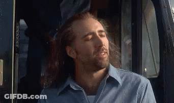 Man With Long Hair And Beard Sitting In Back Seat Of Car GIF