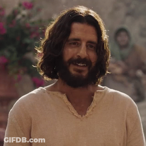 Man With Long Hair And Beard Smiles GIF