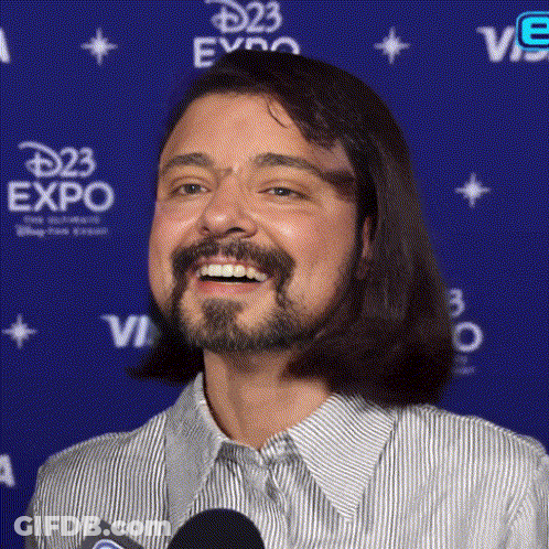 Man With Long Hair And Beard Smiling GIF