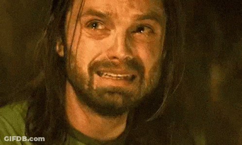 Man With Long Hair And Beard Smiling Looking Up GIF