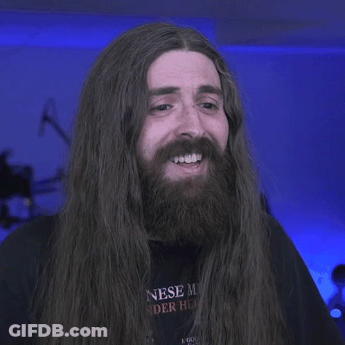 Man With Long Hair And Beard Smiling Saying Ridiculous GIF