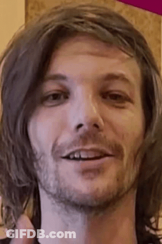 Man With Long Hair And Beard Smiling GIF
