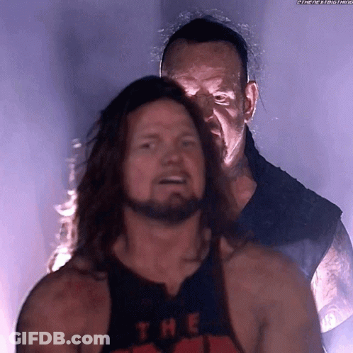 Man With Long Hair And Beard Wearing Undertaker Tank Top GIF