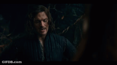 Man With Long Hair And Black Jacket Holding Up Hand GIF