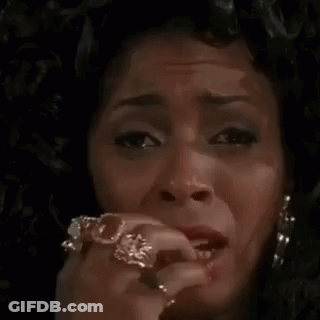 Man With Long Hair And Bow And Arrow In Field GIF