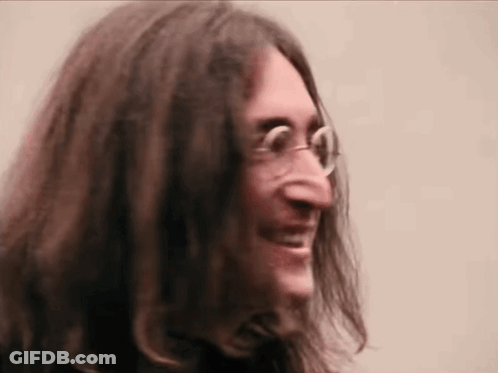Man With Long Hair And Glasses Smiling GIF