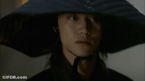 Man With Long Hair And Hat GIF