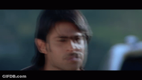 Man With Long Hair And Mustache Close Up GIF