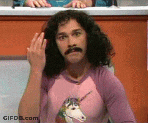 Man With Long Hair And Mustache In Pink Unicorn Shirt GIF