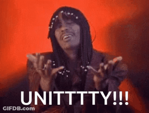 Man With Long Hair And Pearls Says Unittty GIF