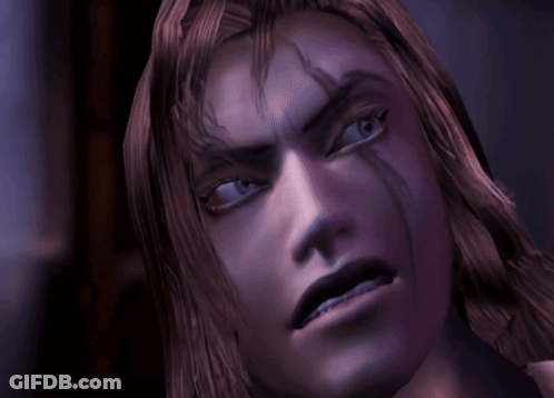 Man With Long Hair And Woman With Red Hair GIF