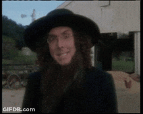 Man With Long Hair, Beard, And Hat GIF