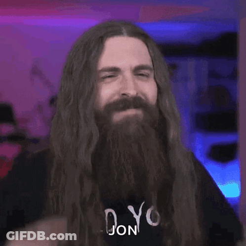 Man With Long Hair Beard And Shirt Saying Jon GIF