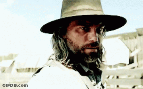 Man With Long Hair Beard Hat Looking Camera GIF