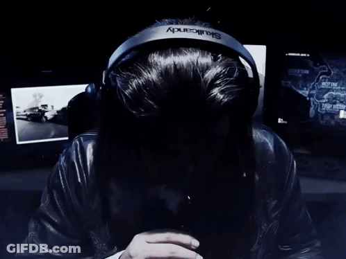 Man With Long Hair Beard Headphones Blowing Smoke GIF